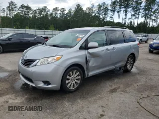 2014 Toyota Sienna LE with VIN 5TDJK3DC5ES088097, listed as a Copart auction lot 60397025 with 213,895 mi miles and Salvage title. Bid and sale history available at DreamBid. Image 1.