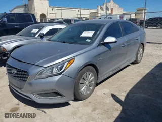 2016 Hyundai Sonata Hybrid SE with VIN KMHE24L15GA025570, listed as a IAAI auction lot 41735029 with 142,346 mi miles. Bid and sale history available at carsss.com. Image 2.