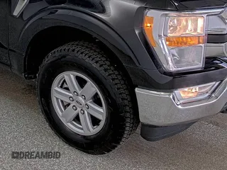 2021 Ford F-150 XL with VIN 1FTFW1E53MFB64722, listed as a IAAI auction lot 42905391 with 80,356 mi miles and . Bid and sale history available at DreamBid. Image 21.