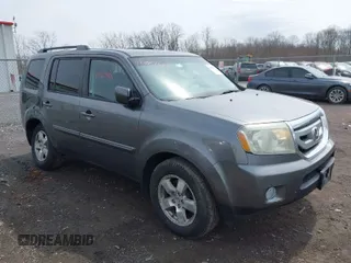2011 Honda Pilot EX-L with VIN 5FNYF4H54BB065902, listed as a IAAI auction lot 42027555 with 184,732 mi miles. Bid and sale history available at carsss.com. Image 1.