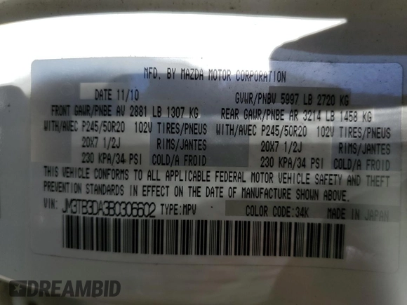 2011 Mazda CX-9 Grand Touring with VIN JM3TB3DA3B0306602, listed as a Copart auction lot 52611555 with 117,907 mi miles and Salvage title. Bid and sale history available at DreamBid. Image 13.