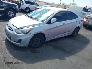 2014 Hyundai Accent GLS with VIN KMHCT4AE9EU688954, listed as a IAAI auction lot 42141664 with 99,041 mi miles. Bid and sale history available at carsss.com. Image 2.