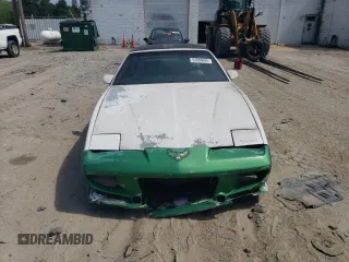 1991 Pontiac Firebird z VIN 1G2FS23E5ML239639, wystawiony jako Copart lot #54986095 z przebiegiem 154 017 mil mil oraz Tytuł czysty. Historia ofert i sprzedaży dostępna na DreamBid. Obrazek 5.