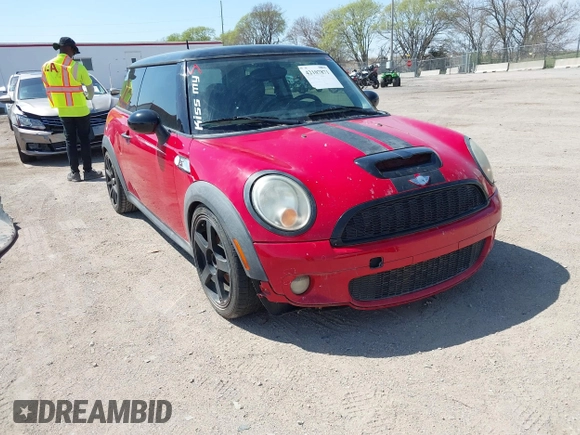 2010 MINI Hardtop S with VIN WMWMF7C51ATX43277, listed as a IAAI auction lot 42107871 with 102,886 mi miles and . Bid and sale history available at DreamBid. Image 1.