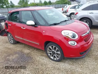 2014 FIAT 500L Lounge z VIN ZFBCFACH5EZ009320, wystawiony jako IAAI lot #42340573 z przebiegiem 147 946 mil mil oraz . Historia ofert i sprzedaży dostępna na DreamBid. Obrazek 1.