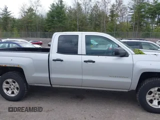 2014 Chevrolet Silverado 1500 LT with VIN 1GCVKREC8EZ151534, listed as a IAAI auction lot 42221023 with 216,835 mi miles and . Bid and sale history available at DreamBid. Image 13.