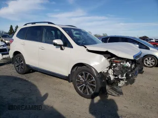 2017 Subaru Forester Touring with VIN JF2SJGWC4HH527716, listed as a Copart auction lot 47662705 with 61,901 mi miles and Salvage Title. Bid and sale history available at carsss.com. Image 4.