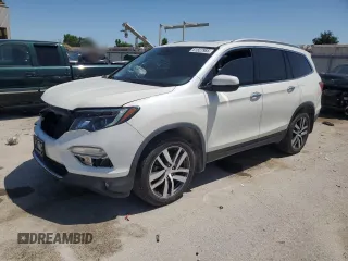 2017 Honda Pilot Elite with VIN 5FNYF6H02HB090919, listed as a Copart auction lot 61827985 with 140,556 mi miles and Salvage title. Bid and sale history available at DreamBid. Image 1.