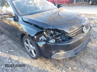 2012 Volkswagen Jetta SE with VIN 3VWBP7AJ3CM338852, listed as a IAAI auction lot 41011223 with 307,098 mi miles and . Bid and sale history available at DreamBid. Image 6.