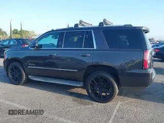 2015 GMC Yukon Denali z VIN 1GKS1CKJ7FR566419, wystawiony jako IAAI lot #41948825 z przebiegiem 235 037 mil mil oraz . Historia ofert i sprzedaży dostępna na DreamBid. Obrazek 14.