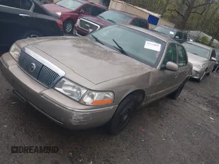 2004 Mercury Grand Marquis GS with VIN 2MEFM74W24X604421, listed as a IAAI auction lot 41929099 with 200,500 mi miles and . Bid and sale history available at DreamBid. Image 2.