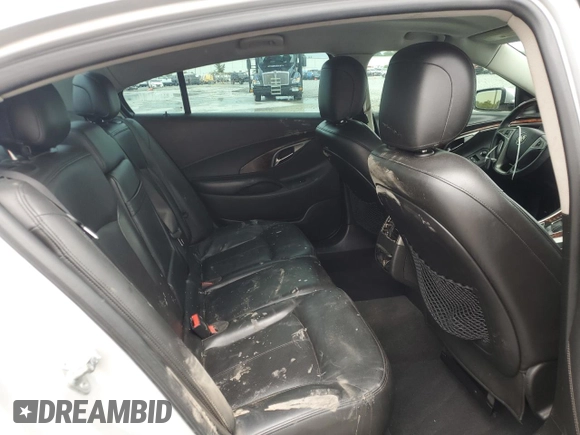 2013 Buick LaCrosse Premium 1 z VIN 1G4GF5E33DF170154, wystawiony jako Copart lot #59536615 z przebiegiem 213 717 mil mil oraz Szkoda całkowita • Salvage title. Historia ofert i sprzedaży dostępna na DreamBid. Obrazek 10.