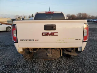 2019 GMC Canyon 4WD SLE with VIN 1GTG6CEN0K1293351, listed as a Copart auction lot 88470035 with 49,469 mi miles and Salvage Title. Bid and sale history available at carsss.com. Image 6.