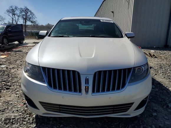 2011 Lincoln MKS EcoBoost with VIN 1LNHL9FT7BG611097, listed as a Copart auction lot 48180885 with 140,262 mi miles and Salvage title. Bid and sale history available at DreamBid. Image 5.
