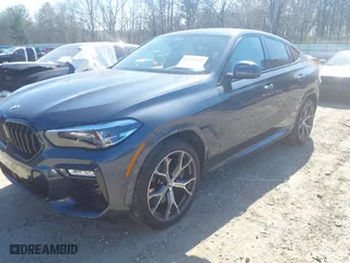 2021 BMW X6 M50i with VIN 5UXCY8C07M9E32426, listed as a IAAI auction lot 41715641 with 23,000 mi miles. Bid and sale history available at carsss.com. Image 17.