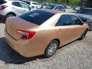 2012 Toyota Camry L with VIN 4T1BF1FKXCU030959, listed as a IAAI auction lot 42022501 with 304,524 mi miles. Bid and sale history available at carsss.com. Image 4.