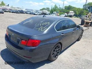 2013 BMW 5 Series 528i xDrive with VIN WBAXH5C57DD114603, listed as a IAAI auction lot 42592212 with 133,058 mi miles and . Bid and sale history available at DreamBid. Image 4.