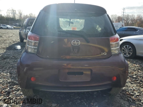 2013 Scion iQ with VIN JTNJJXB00DJ022017, listed as a Copart auction lot 82717994 with Not provided miles and Salvage title. Bid and sale history available at DreamBid. Image 6.