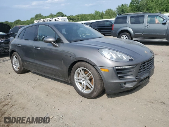 2015 Porsche Macan S with VIN WP1AB2A50FLB69249, listed as a Copart auction lot 60865995 with 128,659 mi miles and Salvage title. Bid and sale history available at DreamBid. Image 4.