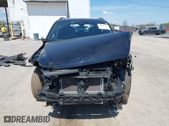 2022 Volkswagen Tiguan SE R-Line Black z VIN 3VV8B7AX8NM083992, wystawiony jako IAAI lot #42101368 z przebiegiem 40 319 mil mil oraz . Historia ofert i sprzedaży dostępna na DreamBid. Obrazek 13.