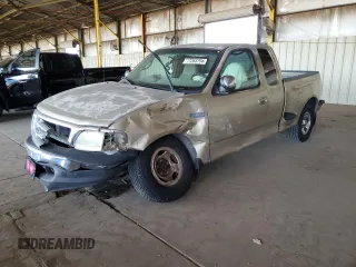 1999 Ford F-150 XL with VIN 1FTZX0722XKA93631, listed as a Copart auction lot 77263794 with Not provided miles and Salvage title. Bid and sale history available at DreamBid. Image 1.