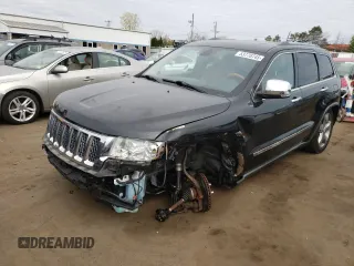 2011 Jeep Grand Cherokee Overland with VIN 1J4RR6GT9BC660730, listed as a Copart auction lot 53770745 with 106,351 mi miles and Salvage title. Bid and sale history available at DreamBid. Image 1.