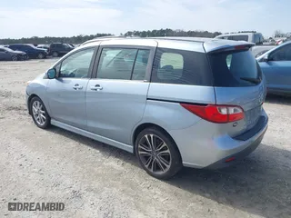 2012 Mazda Mazda5 Grand Touring with VIN JM1CW2DL1C0142664, listed as a IAAI auction lot 41585909 with 211,875 mi miles. Bid and sale history available at carsss.com. Image 3.