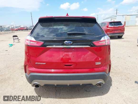 2020 Ford Edge SEL z VIN 2FMPK3J96LBA10912, wystawiony jako IAAI lot #42144667 z przebiegiem 88 722 mil mil oraz . Historia ofert i sprzedaży dostępna na DreamBid. Obrazek 17.