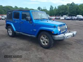 2015 Jeep Wrangler Unlimited Sahara with VIN 1C4BJWEG4FL677879, listed as a IAAI auction lot 42676097 with 85,821 mi miles and . Bid and sale history available at DreamBid. Image 1.