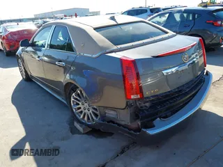 2012 Cadillac CTS Luxury z VIN 1G6DF5E58C0142041, wystawiony jako IAAI lot #42235864 z przebiegiem 59 697 mil mil oraz . Historia ofert i sprzedaży dostępna na DreamBid. Obrazek 6.