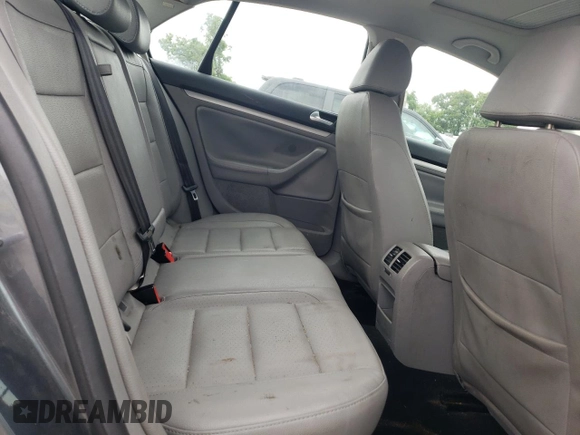 2008 Volkswagen Jetta SE with VIN 3VWRM71K08M037186, listed as a Copart auction lot 60173795 with 186,594 mi miles and Salvage title. Bid and sale history available at DreamBid. Image 10.