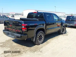 2024 Nissan Frontier Pro-4X with VIN 1N6ED1EK3RN654112, listed as a IAAI auction lot 41686345 with 14,893 mi miles and . Bid and sale history available at DreamBid. Image 4.