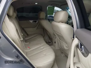 2014 Infiniti QX70 z VIN JN8CS1MU3EM451745, wystawiony jako IAAI lot #42203922 z przebiegiem 144 990 mil mil oraz . Historia ofert i sprzedaży dostępna na DreamBid. Obrazek 8.