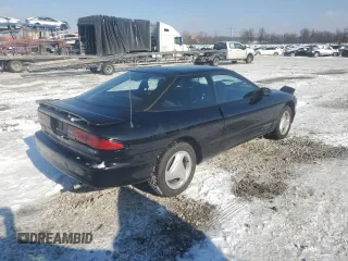 1996 Ford Probe z VIN 1ZVLT20A6T5129311, wystawiony jako Copart lot #87306604 z przebiegiem 117 729 mil mil oraz Tytuł czysty. Historia ofert i sprzedaży dostępna na DreamBid. Obrazek 3.