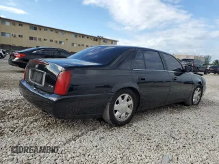 2002 Cadillac DeVille DTS with VIN 1G6KF57962U233811, listed as a Copart auction lot 80435034 with 62,005 mi miles and Salvage Title. Bid and sale history available at carsss.com. Image 3.