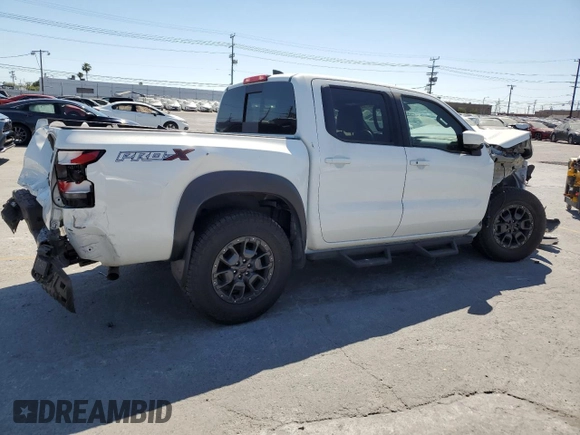 2023 Nissan Frontier SV with VIN 1N6ED1EJ3PN670640, listed as a Copart auction lot 58039525 with 15,302 mi miles and Salvage title. Bid and sale history available at DreamBid. Image 3.