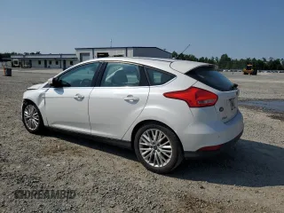 2015 Ford Focus Titanium с VIN 1FADP3N24FL214429, выставлен на аукционе Copart как лот 59159075 с пробегом 157 353 миль миль и Списание • Salvage title. История ставок и продаж доступна на DreamBid. Изображение 2.