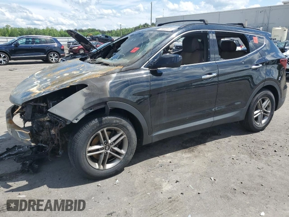 2017 Hyundai Santa Fe 2.4L z VIN 5NMZUDLB9HH013230, wystawiony jako Copart lot #55888975 z przebiegiem Nie podano mil oraz Szkoda całkowita • Salvage title. Historia ofert i sprzedaży dostępna na DreamBid. Obrazek 1.