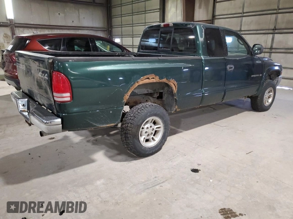 1999 Dodge Dakota SLT with VIN 1B7GG22Y9XS299933, listed as a Copart auction lot 82360644 with 146,506 mi miles and Clean Title. Bid and sale history available at DreamBid. Image 3.