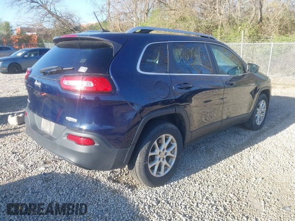 2015 Jeep Cherokee Latitude with VIN 1C4PJMCB1FW709560, listed as a IAAI auction lot 42035619 with 162,354 mi miles. Bid and sale history available at carsss.com. Image 4.