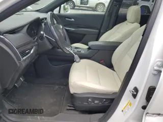 2019 Cadillac XT4 FWD Sport with VIN 1GYFZER44KF210582, listed as a Copart auction lot 61272015 with 104,073 mi miles and Salvage title. Bid and sale history available at DreamBid. Image 7.