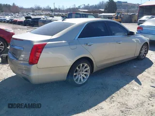 2014 Cadillac CTS Luxury RWD with VIN 1G6AR5SX3E0123075, listed as a IAAI auction lot 41768726 with 184,457 mi miles. Bid and sale history available at carsss.com. Image 4.