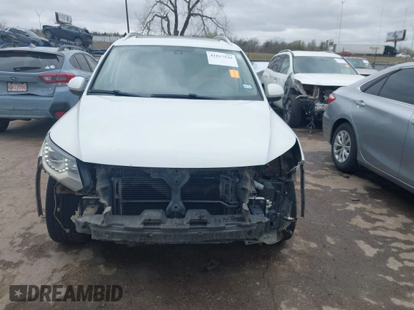 2016 Volkswagen Tiguan S with VIN WVGBV7AX0GW550784, listed as a IAAI auction lot 41817544 with 109,246 mi miles and . Bid and sale history available at DreamBid. Image 13.