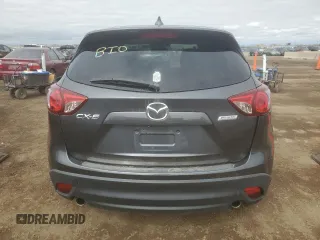 2014 Mazda CX-5 Touring with VIN JM3KE2CYXE0357272, listed as a Copart auction lot 52587565 with 139,937 mi miles and Clean Title. Bid and sale history available at carsss.com. Image 6.
