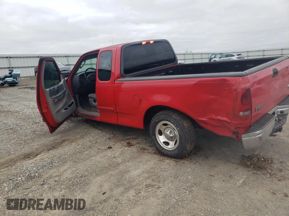 2002 Ford F-150 XL with VIN 1FTRX17W12NB06157, listed as a Copart auction lot 51209485 with 167,953 mi miles and Salvage Title. Bid and sale history available at carsss.com. Image 2.