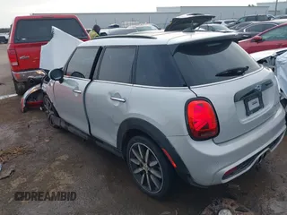 2019 MINI Hardtop 4 Door Cooper S with VIN WMWXU3C59K2H87159, listed as a IAAI auction lot 41225965 with 76,640 mi miles and . Bid and sale history available at DreamBid. Image 3.