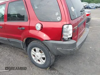 2004 Ford Escape XLT with VIN 1FMYU93154DA14180, listed as a IAAI auction lot 42430706 with 266,213 mi miles and . Bid and sale history available at DreamBid. Image 6.