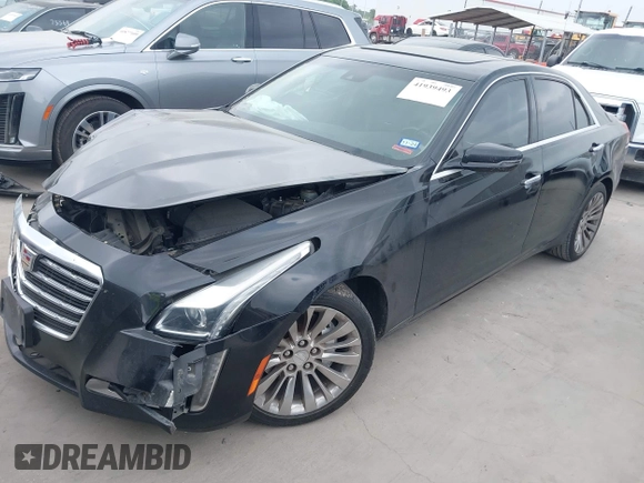 2018 Cadillac CTS Luxury RWD z VIN 1G6AR5SS5J0145335, wystawiony jako IAAI lot #41939493 z przebiegiem 202 429 mil mil oraz . Historia ofert i sprzedaży dostępna na DreamBid. Obrazek 17.