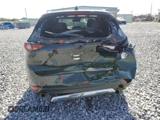2021 Mazda CX-5 Signature with VIN JM3KFBEY5M0439676, listed as a Copart auction lot 52823285 with 41,811 mi miles and Non Repairable. Bid and sale history available at carsss.com. Image 6.