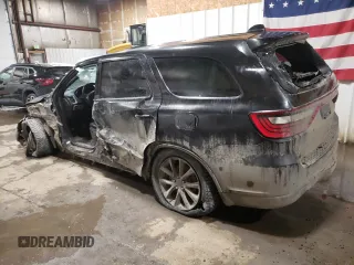 2014 Dodge Durango R/T with VIN 1C4SDJCT9EC977300, listed as a Copart auction lot 49930435 with 165,569 mi miles and Salvage title. Bid and sale history available at DreamBid. Image 2.